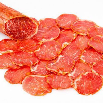 Lomo Ibérico de Bellota 100% – Curación Natural y Sabor Gourmet Lomo de Bellota 100% Ibérico curado artesanalmente con especias naturales